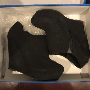 Black wedge booties